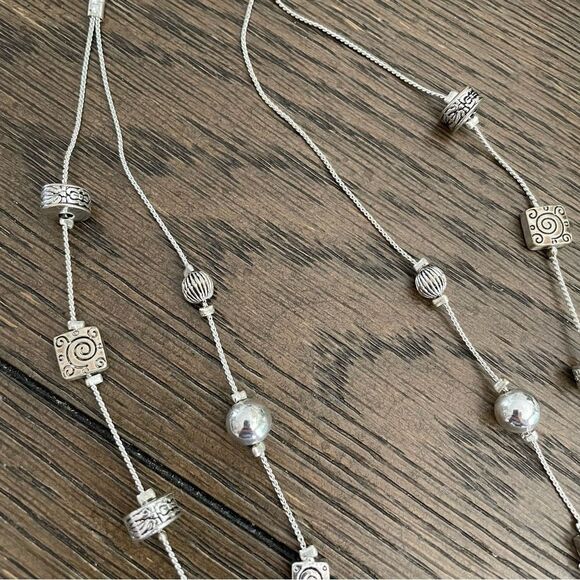 Silver tone double Strand multi charm necklace - Picture 3 of 5